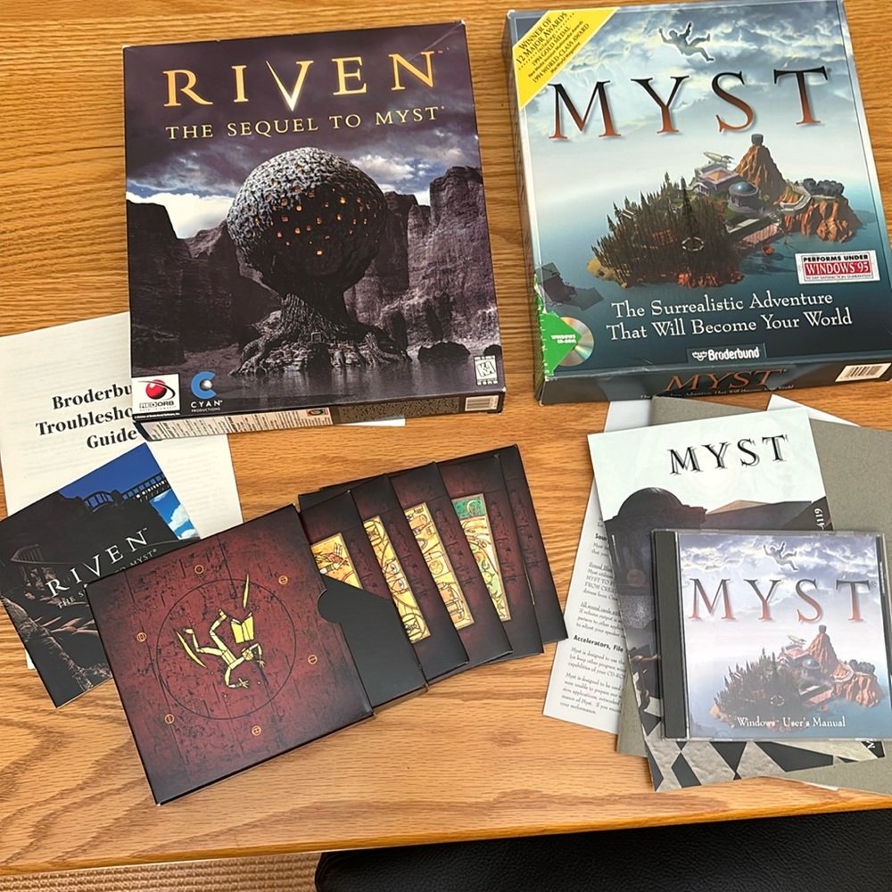 Myst and Riven computer games for PC. Complete with users guides , in box